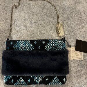 Crossbody or clutch with handwarmer